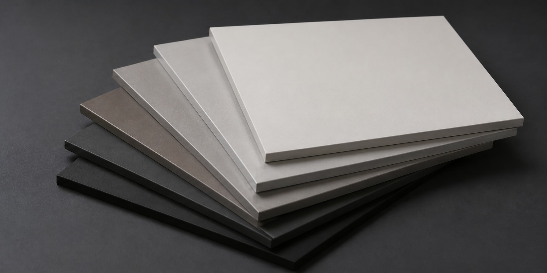 Stack of deep matt front surface samples in neutral shades